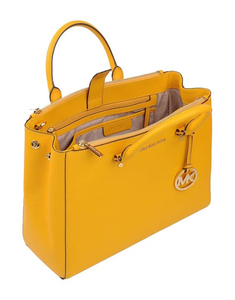 michael kors purse beige and yellow lining|Michael Kors yellow shoulder bag.